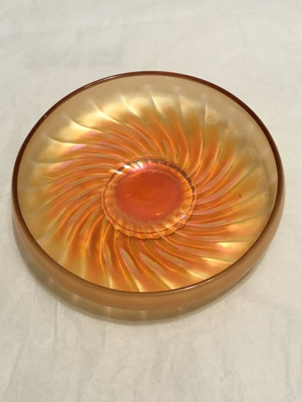 Gorgeous old Marigold swirl carnival glass bowl with pedestal base